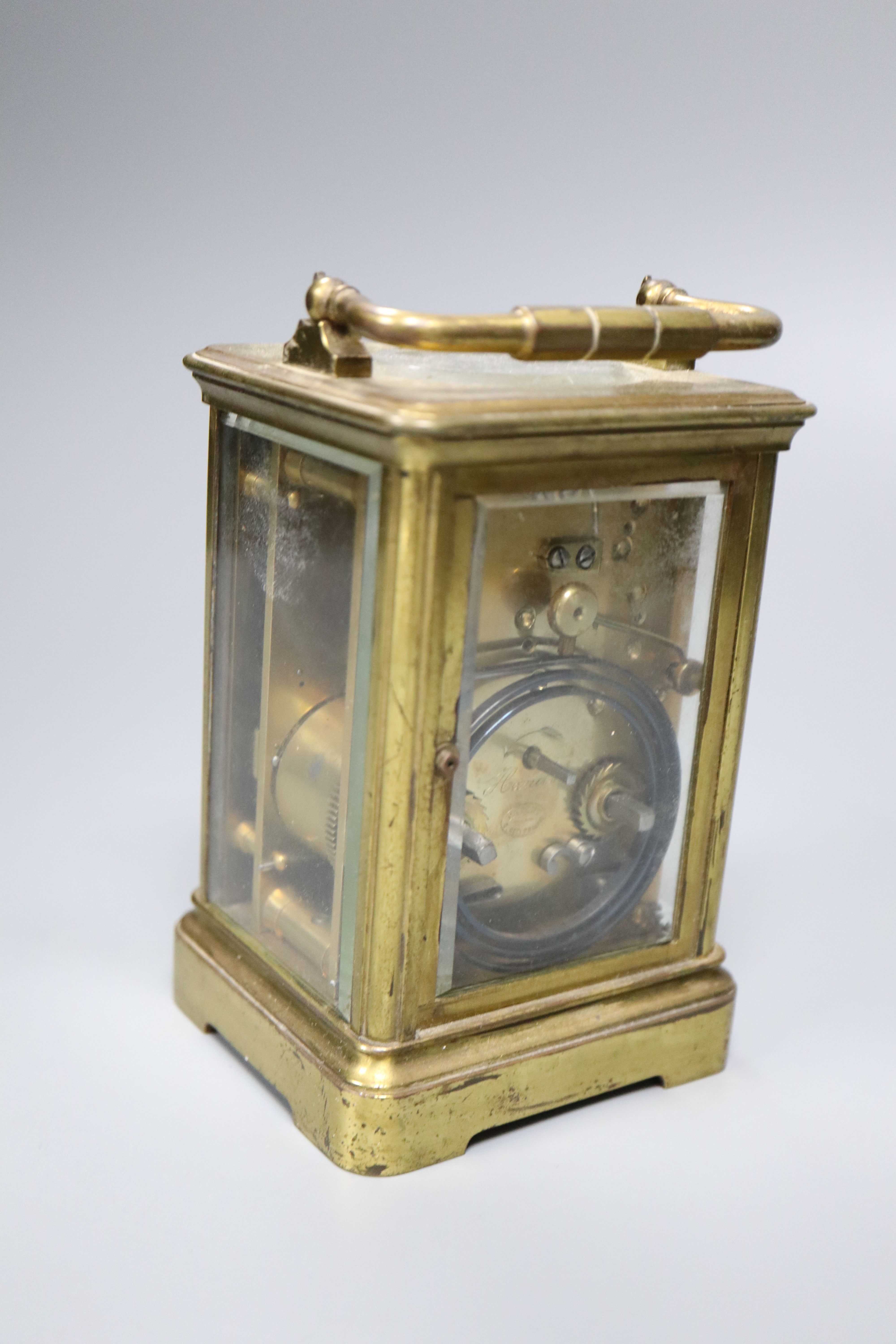 An hour repeating brass carriage clock,14cm